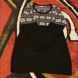 A black Christmas sweater like dress